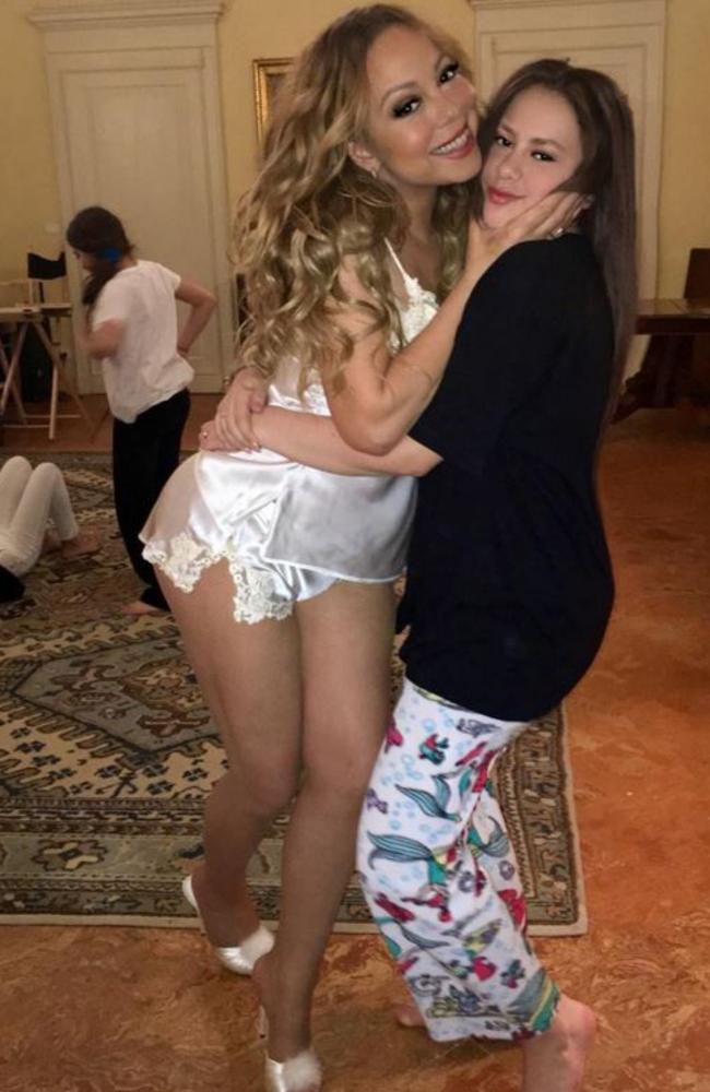 Looks like Mariah’s having some kind of sleepover. While her pal is happy to lounge about in more appropriate pyjamas, Mariah wears a skimpy silky number. The fluffy heels complete her look. Picture: Instagram