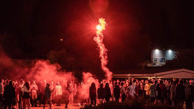 Hundreds of teenagers mill around on the Rye foreshore. Picture: Jason Edwards