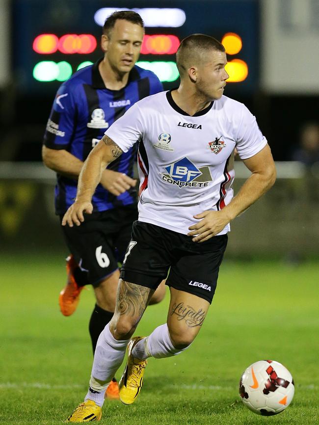 Travis Major of Blacktown City looks to pass the ball during the National Premier League Grand Final.