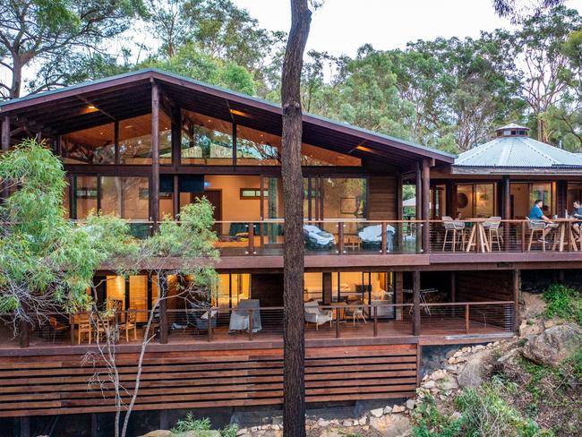 Billabong Retreat, NSW. Main building -- showing Treetop Yoga studio with meditation room (yurt). There is another yurt (off camera to the right) housing kitchen and dining room.  All connected by large veranda and deck area.Treatment rooms below left.