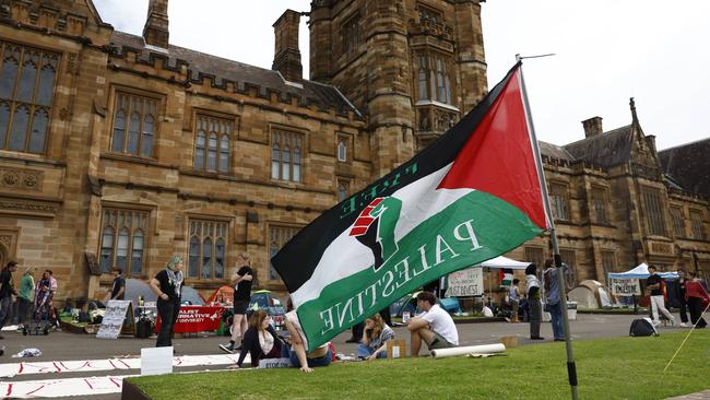 Students setting up for a Pro-Palestinian sit in on Wednesday. Picture: Richard Dobson