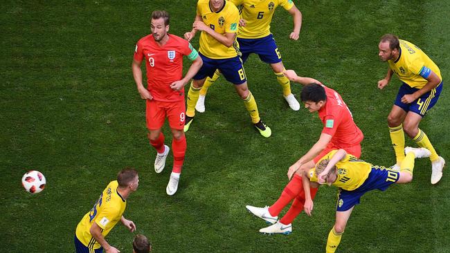 England defender Harry Maguire (second from right) heads England into the lead against Sweden in last week’s World Cup quarter-final. Photo: AFP