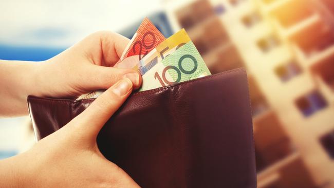 AUSTRALIAN CURRENCY/ DOLLARS/  PICTURE: istock australian money in wallet on real estate background