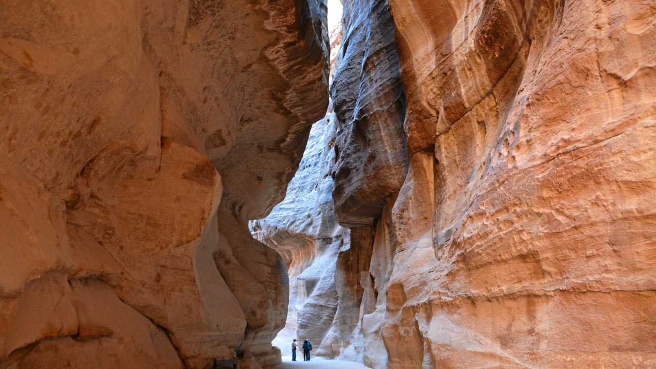 Ancient Petra, in Jordan's south, is one of the seven new wonders of the world. This narrow siq has been cut through deep rock as the entrance to the former trading city. Photo: Rae Wilson. Picture: Rae Wilson