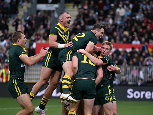 The Kangaroos celebrate Lindsay Collins' try. NRL Imagery