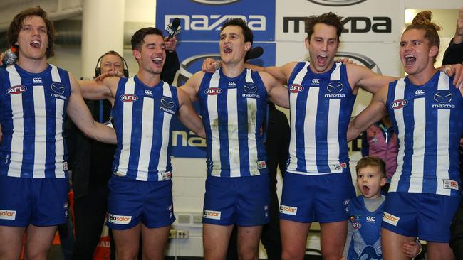 North Melbourne players join the chorus. Picture: Michael Klein