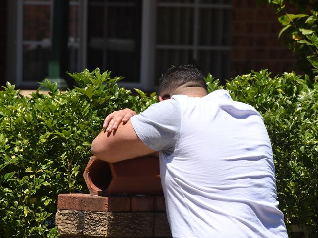 A man breaks down after hearing two children died following the horror car accident. Picture: Dean Lewins/AAP