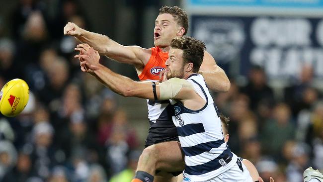 Heath Shaw spoils Geelong’s Jordan Murdoch. Picture: Michael Klein