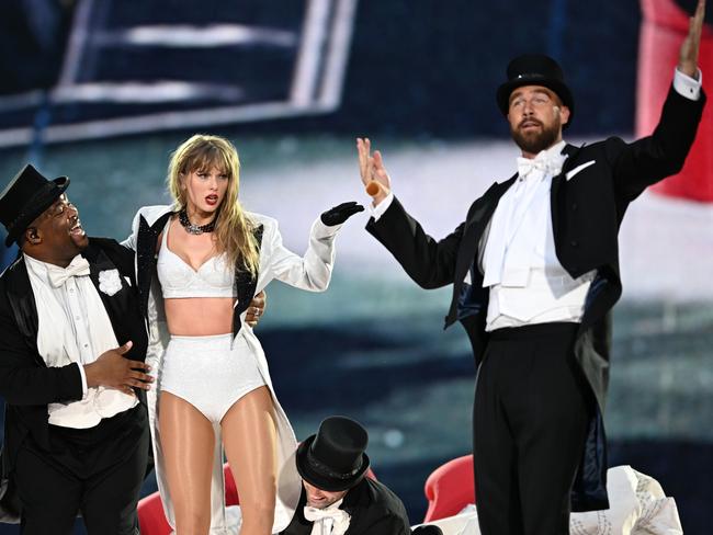 Taylor Swift is joined on stage by her boyfirend Travis Kelce at her London concert. Picture: Gareth Cattermole.