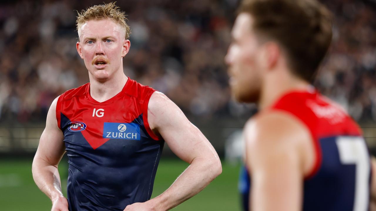 MELBOURNE, AUSTRALIA - SEPTEMBER 15: Clayton Oliver of the Demons looks dejected after a loss during the 2023 AFL First Semi Final match between the Melbourne Demons and the Carlton Blues at Melbourne Cricket Ground on September 15, 2023 in Melbourne, Australia. (Photo by Dylan Burns/AFL Photos via Getty Images)