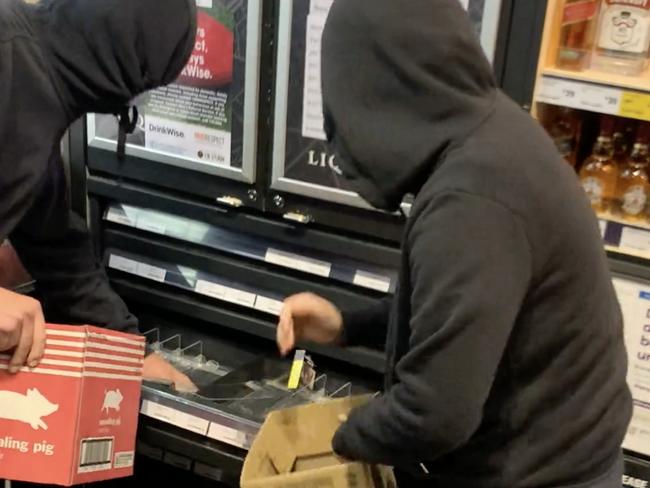 Two kids raiding cigarettes in Coles Elsternwick