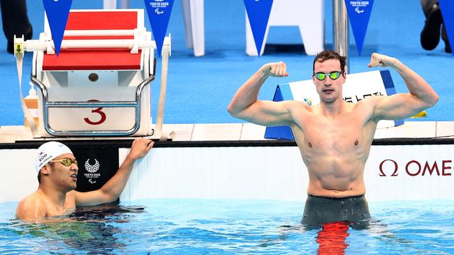 Benjamin James Hance (R) of Team Australia celebrates winning the gold medal after competing in the Men's 100m Backstroke – S14 Final on day 9 of the Tokyo 2020 Paralympic Games at Tokyo Aquatics Centre on September 02, 2021 in Tokyo, Japan. (Photo by Dean Mouhtaropoulos/Getty Images for New Zealand Paralympic Committee)