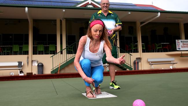 Carol Mayer and Edge Hill Bowls Club president Neil Beitzel take part in the club’s charity challenge bowls tournament to raise money for the Ravenshoe cafe blast victims. PICTURE: STEWART McLEAN