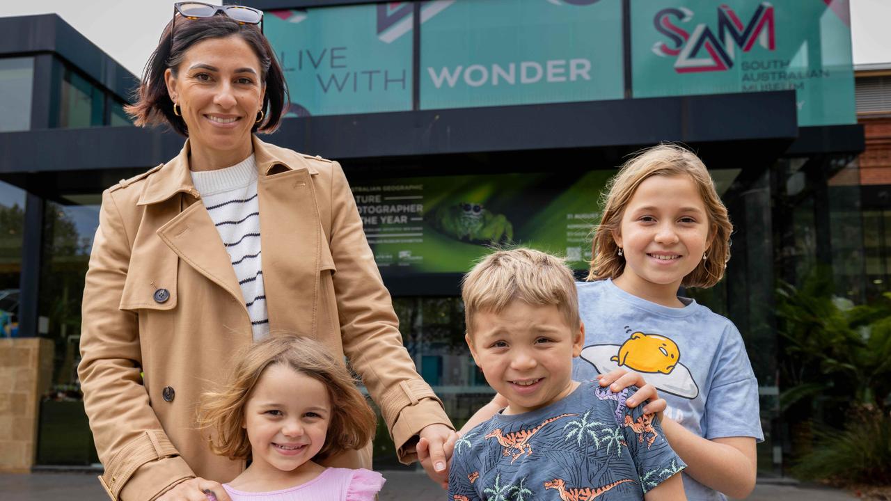 Katherine Todd and her children Ruby, four, Rocco, seven, and Isla, eight, welcome news the South Australian Museum’s Egyptian room will be kept safe. Picture: Ben Clark