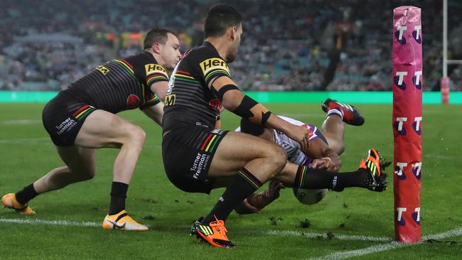 Melbourne's Justin Olam scores a penalty try during the 2020 NRL grand final between the Penrith Panthers and Melbourne Storm at ANZ Stadium. Defender Tyrone May was penalised for attacking with the foot. Picture: Brett Costello