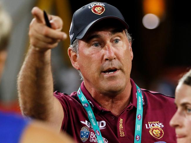 GOLD COAST, AUSTRALIA - NOVEMBER 18: Craig Starcevich, Senior Coach of the Lions addresses his players during the 2022 S7 AFLW First Preliminary Final match between the Brisbane Lions and the Adelaide Crows at Metricon Stadium on November 18, 2022 in the Gold Coast, Australia. (Photo by Dylan Burns/AFL Photos via Getty Images)