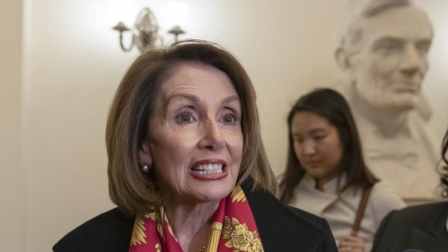 Speaker of the House Nancy Pelosi, D-Calif., responds to reporters after officially postponing President Donald Trump's State of the Union address until the government is fully reopened, at the Capitol in Washington, Wednesday, Jan. 23, 2019. The California Democrat told Trump in a letter Wednesday the Democratic-controlled House won't pass the required measure for him to give the nationally televised speech from the House floor. (AP Photo/J. Scott Applewhite)