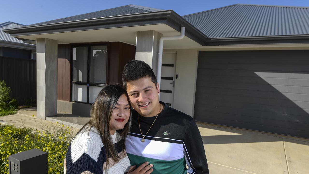 Lilisha Malla and husband Lawrence Chan outside their new home in Davoren Park, which has experienced significant value growth over the past quarter and year. Picture: RoyVPhotography