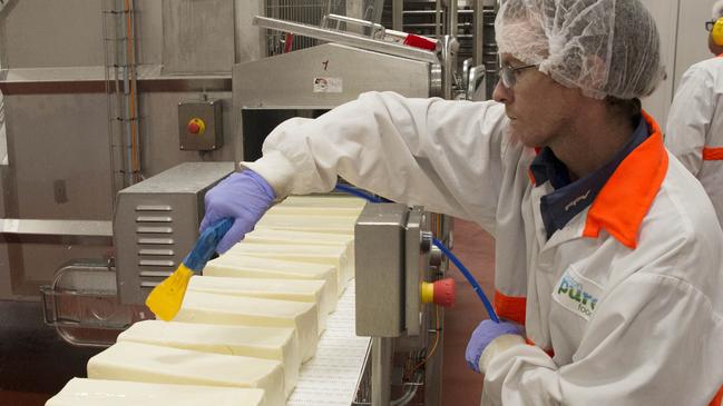 A Beston employee works on the mozzarella production line at the Jervois plant in 2018. Photo: Walter Bulyga