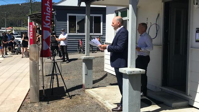 Auctioneer Sam Woolcock with agent Doug Marshall at the 70-72 Main St, Derby auction. Picture: Supplied