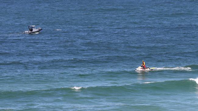 Jet skis patrol the area where shark attack victim Cooper Allen was attacked on Lighthouse Beach, Ballina, last month. Picture: Lyndon Mechielsen/The Australian