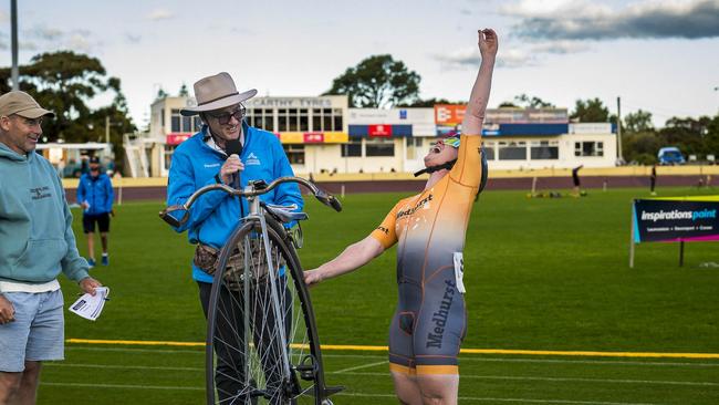 TAS Carnivals - Penny Farthing Michael Bailey Chief Commissaire Aus Cycling announcing record time to Lizanne Wilmot. Picture: Caroline Tan