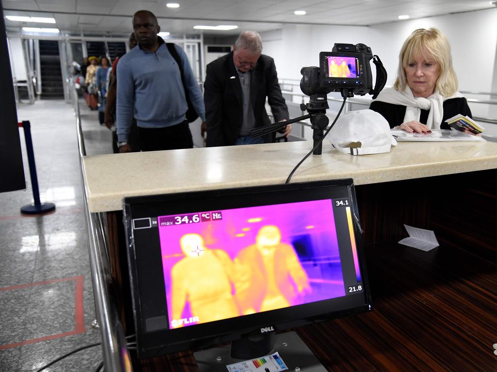 Travellers queue in front of a thermal scanner upon their arrival at the Murtala Mohammed International Airport in Lagos, Nigeria, in January 2019. Picture: Pius Utomi Ekpei/AFP