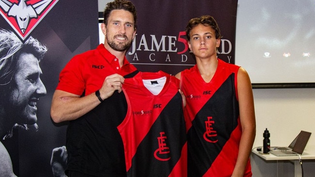 Tex Wanganeen with Essendon academy coach Heath Hocking.