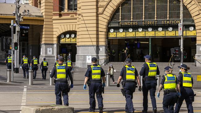 A Police presences is seen at Flinders Street Station. Picture: Daniel Pockett