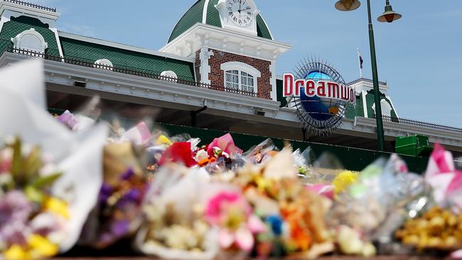 The theme park’s entrance became a makeshift memorial. (Photo by Chris Hyde/Getty Images)