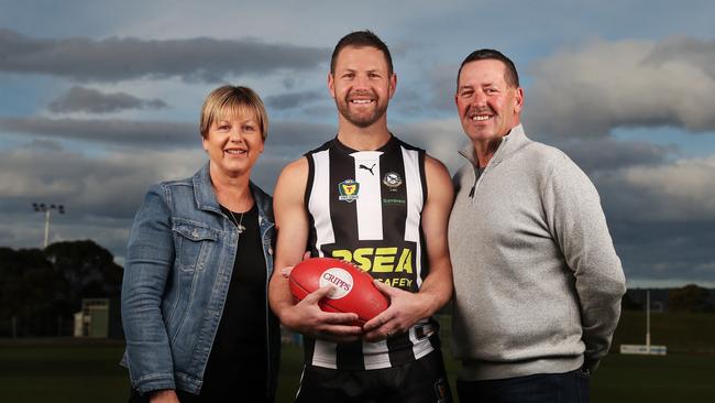 Josh with parents Jane and David Arnold. The pair brought Josh to Glenorchy in 2009 after playing his junior football at Claremont. Picture: Nikki Davis-Jones