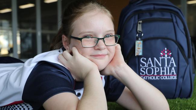 Year 7 student Jessica Bollard was the first student to enrol at the Santa Sophia Catholic College. Pictures: David Swift