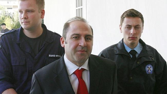 Tony Mokbel after his luck ran out, arrives in an Athens court after being arrested in Greece in 2008. Picture: AP