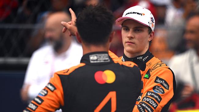 MIAMI, FLORIDA - MAY 03: Second placed Oscar Piastri of Australia and McLaren and Sprint winner Lando Norris of Great Britain and McLaren talk in parc ferme during the Sprint ahead of the F1 Grand Prix of Miami at Miami International Autodrome on May 03, 2025 in Miami, Florida.   Rudy Carezzevoli/Getty Images/AFP (Photo by Rudy Carezzevoli / GETTY IMAGES NORTH AMERICA / Getty Images via AFP)