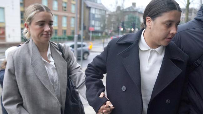 Sam Kerr arrives with her partner Kristie Mewis at Kingston Crown Court. Picture: PA Images via Getty Images.