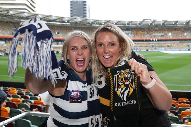 2020 AFL Grand Final match between the. Richmond Tigers and the Geelong Cats at the Gabba on October 24, 2020 in Brisbane, Australia. Sisters, Rebekah Stott and Emily Pfeiffer both from Brisbane. Picture: Sarah Reed