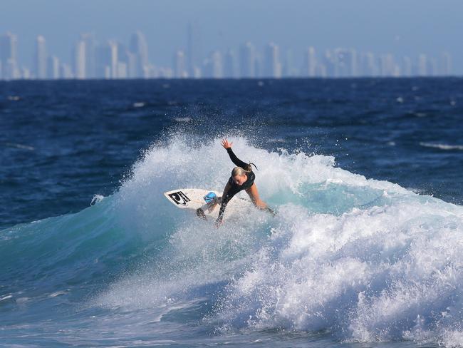 Large swells on the Gold Coast have closed seven beaches. Picture: NIGEL HALLETT