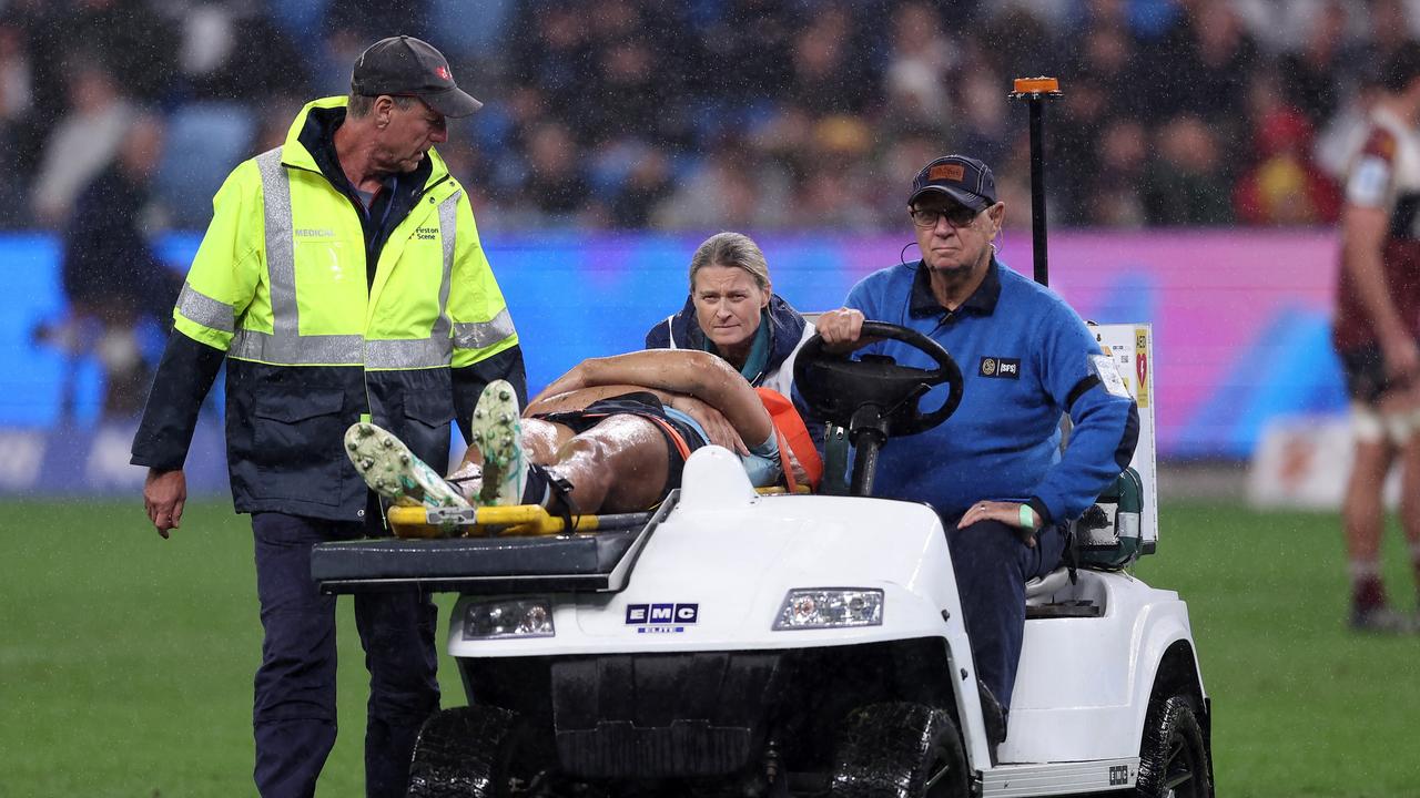 Suaalii stretchered off after sickening head clash