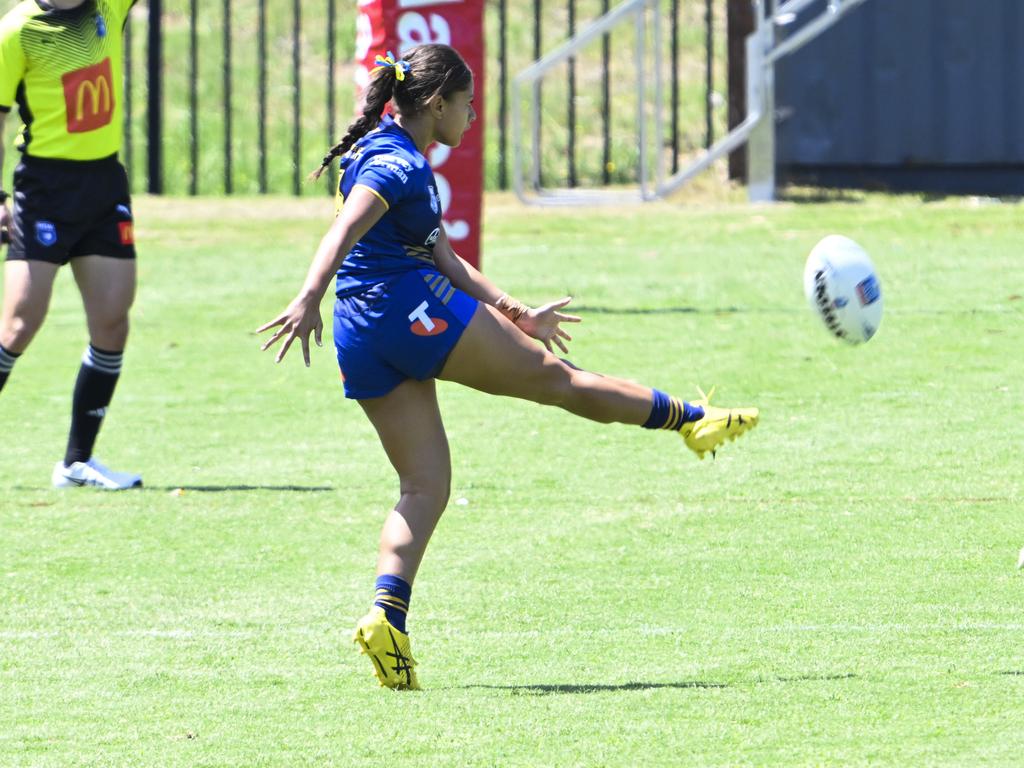 Sharon Latapu kicks ahead. Picture: Martin Ollman