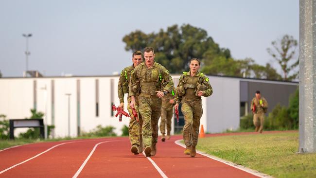 ADF School of Special Operations instructors put around 50 aspiring special operations force candidates through the Special Forces Entry Test beginning late in the afternoon and ending around midnight. Picture: Defence