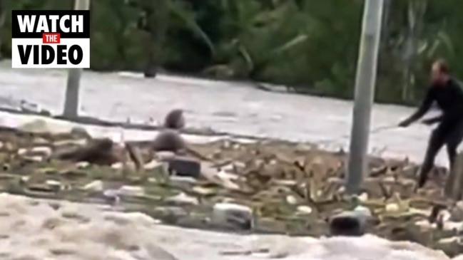 Two teens rescued from rushing floodwaters in Maryborough