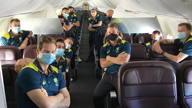 Australian cricketers, including Steve Smith, front, on the plane to Perth on Sunday before they flew to the UK for a six-match tour against England. Picture: Adam Zampa