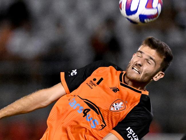 BRISBANE, AUSTRALIA - FEBRUARY 10: Noah Smith of the Roar heads the ball during the round 16 A-League Men's match between Brisbane Roar and Central Coast Mariners at Moreton Daily Stadium, on February 10, 2023, in Brisbane, Australia. (Photo by Bradley Kanaris/Getty Images)