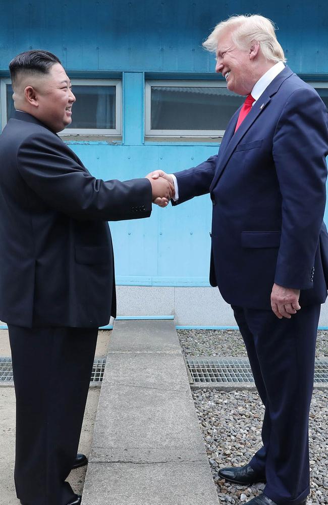 North Korea's leader Kim Jong Un shaking hands with US President Donald Trump. Picture: AFP