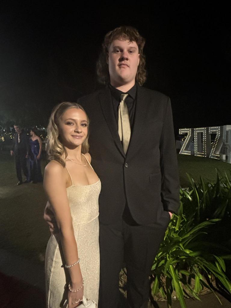 Evie Wharton and Denver Lockett arrive at the formal.