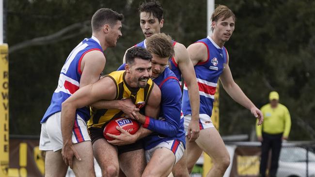 Rowville’s Matthew Davey can’t escape. Picture: Valeriu Campan