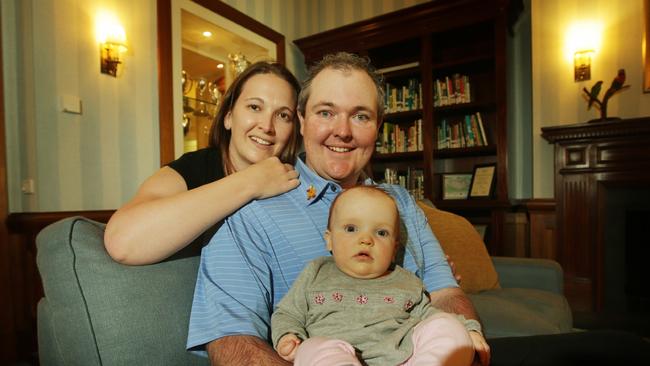 2012: Jarrod Lyle and wife Briony with their daughter Lusi. Picture: Michael Klein