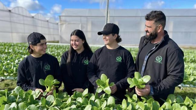 Damien Manno (right) of Quality Harvest with his children (from left) Damien Jr, Alessia and Johnny. Picture: Supplied