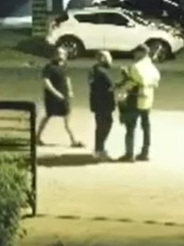 Two neighbours confront the hi-vis wearing man. Picture: Channel 9