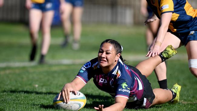 Australian Schools Rugby Championships OPEN GIRLS ACT Vs QLD QLD player Malaela SuÃ&#149;u in action Photo Jeremy Piper